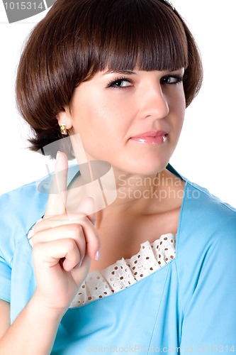 Image of attractive brunet woman in blue dress