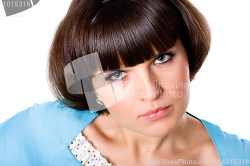 Image of attractive brunet woman in blue