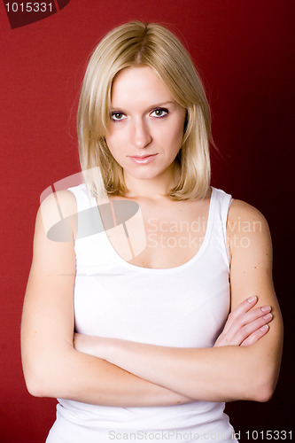 Image of blond woman on red