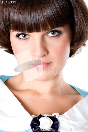 Image of brunet woman in blue dress