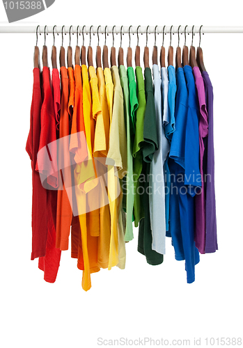 Image of Colors of rainbow, shirts on wooden hangers