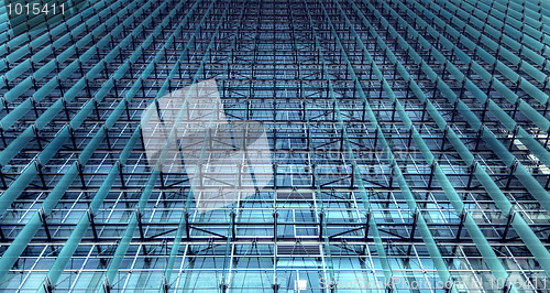 Image of symmetrical glass sunshade on office building