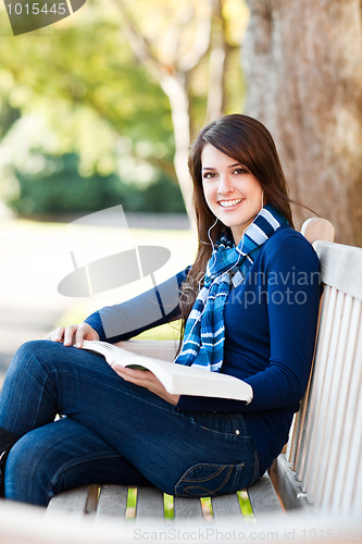 Image of Mixed race college student studying