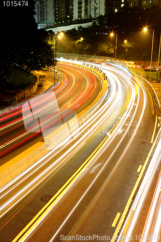 Image of light trails on highway