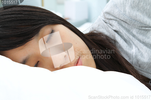 Image of asian woman sleeping