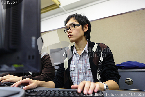 Image of student studying in computer room