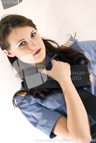 Image of Young attractive woman-policeman  