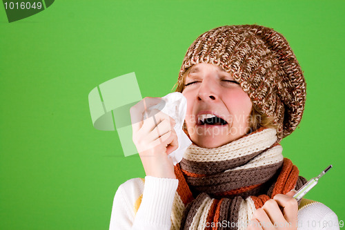 Image of cold girl sneezes