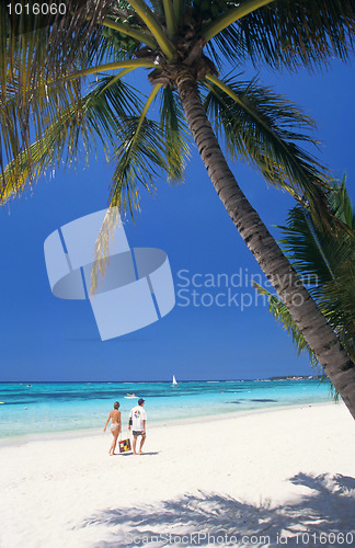 Image of Couple walking on beach, Mauritius Island