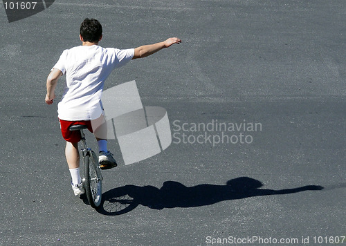 Image of Boy on a unicycle