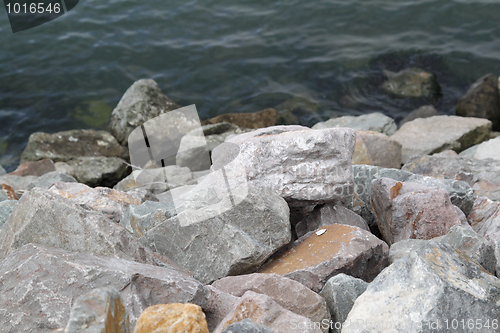 Image of Stones by the water