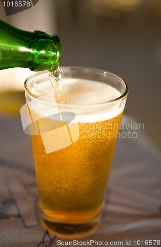 Image of Pouring beer into glass