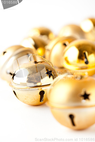 Image of Golden Christmas baubles on white