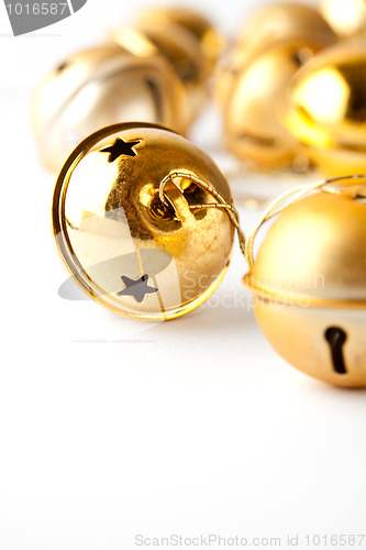 Image of Golden Christmas baubles on white