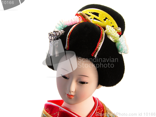 Image of   Geisha doll portrait over white background.The doll is not a trademark!!!!!