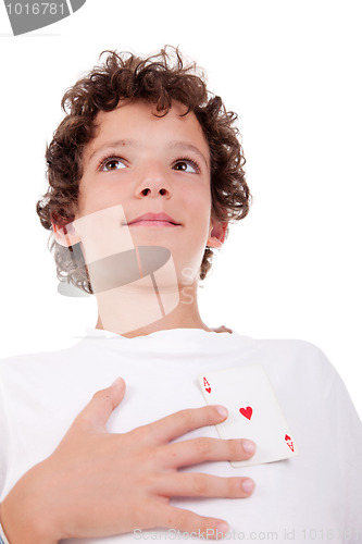 Image of cute boy showing an ace of hearts, in place of the heart