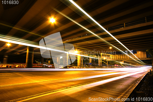 Image of Megacity Highway at night with light trails 