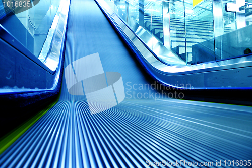 Image of escalator of the subway station in modern building 