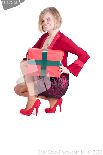 Image of Happy woman with Christmas presents