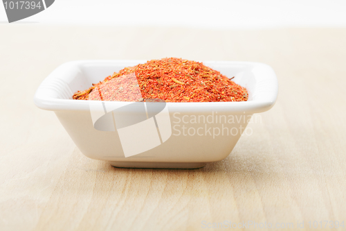 Image of Dish with spice mixture for fish courses on wood