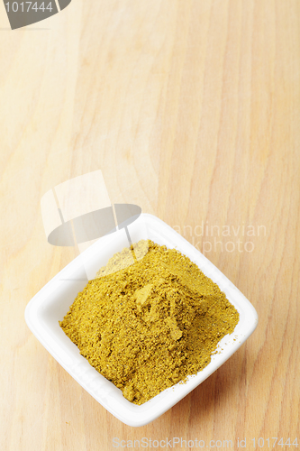 Image of Grounded khmeli suneli spice mixture on wood