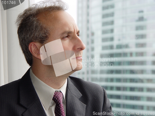 Image of Businessman in his office by the window