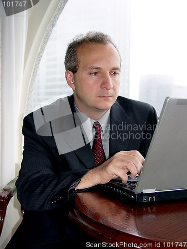 Image of Businessman with laptop