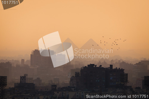 Image of Cairo city skyline and Pyramids