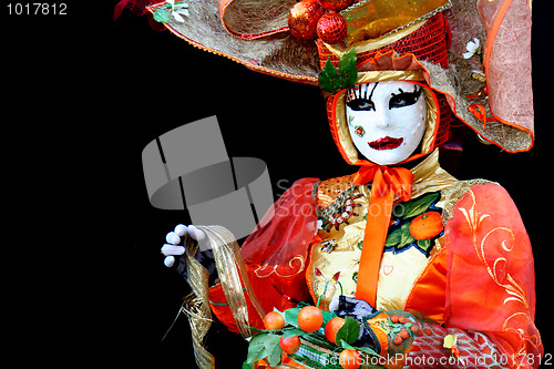 Image of A masked woman at Venice