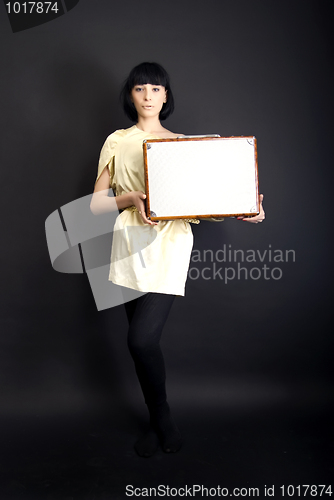 Image of A girl with suitcase   
