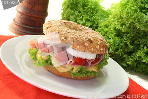 Image of Bagel with ham and egg