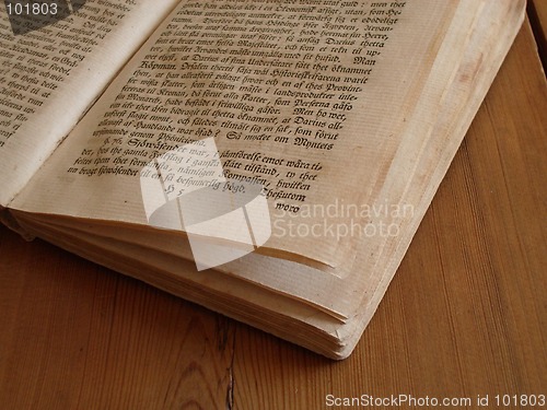 Image of Old book lying on a table