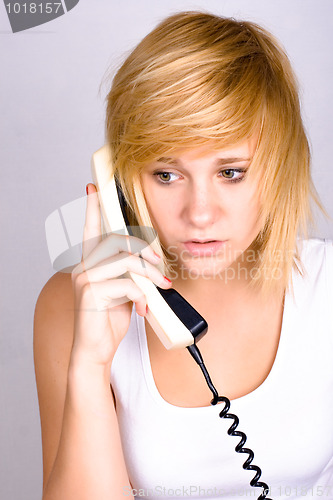 Image of woman with retro telephone 