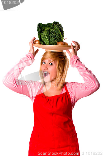 Image of woman with fresh savoy cabbage and onions 