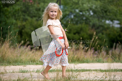 Image of girl with summer flowers