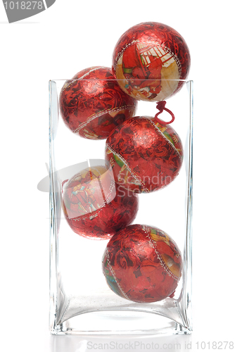 Image of Christmas decorative balls in glass jar