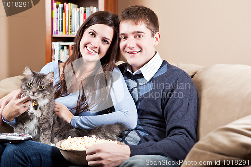 Image of Couple relaxing at home