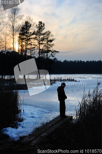 Image of Sunset on the lake in March