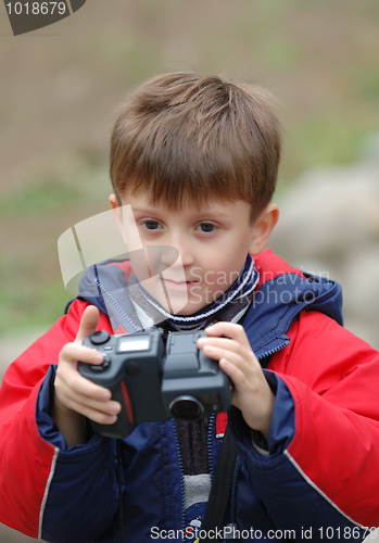 Image of Boy with a camera.