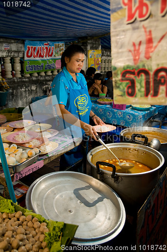 Image of Improvised restaurant at temple fair in Thailand