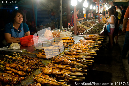Image of Food sales at temple fair in Thailand