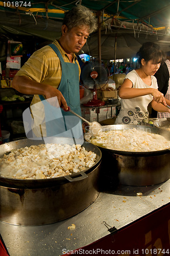 Image of Food sales at temple fair in Thailand