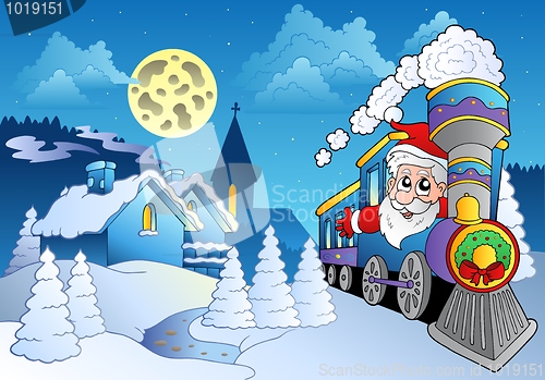 Image of Santa on train near small village