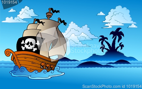 Image of Pirate ship with island silhouette
