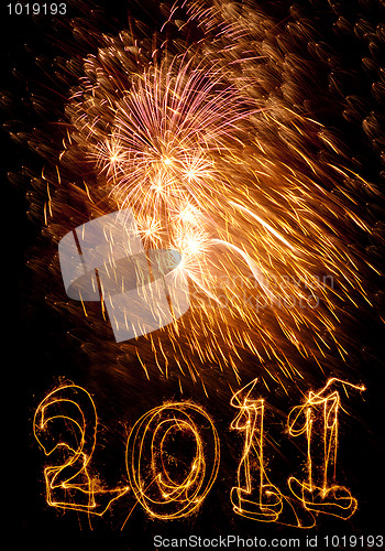 Image of Big firework expldes with 2011 below