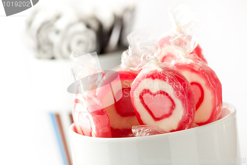Image of Pink and black lollipops