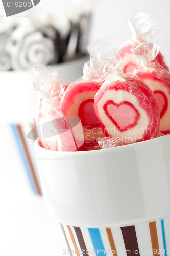 Image of Pink and black lollipops