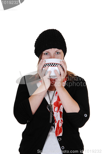 Image of Girl drinking tee.