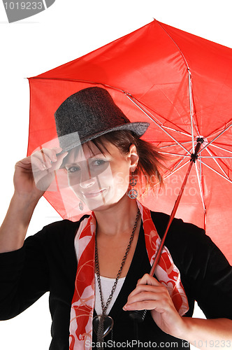 Image of Lady with hat and umbrella.