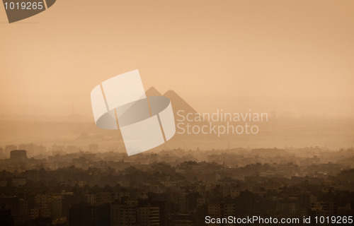 Image of Cairo city skyline and Pyramids